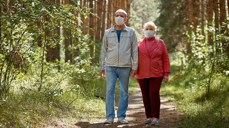 Couple Walking Covid Facemask Walk Adobestock 354148719
